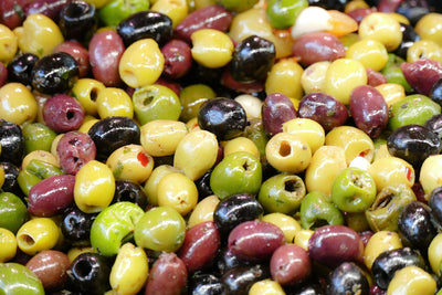 Why are some olives black and others green?